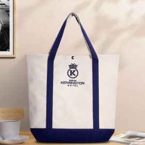 Canvas tote bag lifestyle shot Lifestyle shot of two-tone canvas tote bag placed on a table in a cozy environment