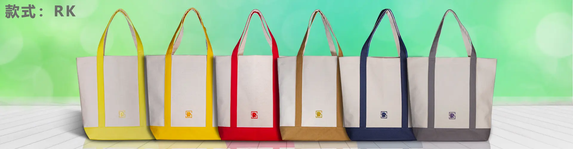 Assorted colors of custom two-tone canvas tote bags with extended reinforced handles, showcasing available color options for OEM branding.