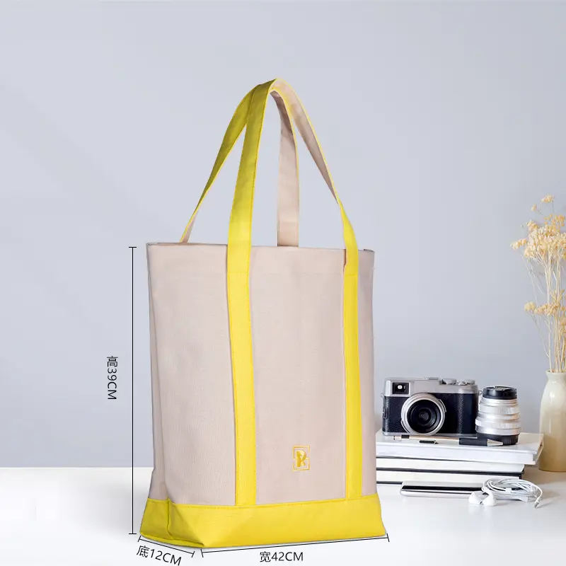 Side view of custom canvas tote bag with yellow extended reinforced handles